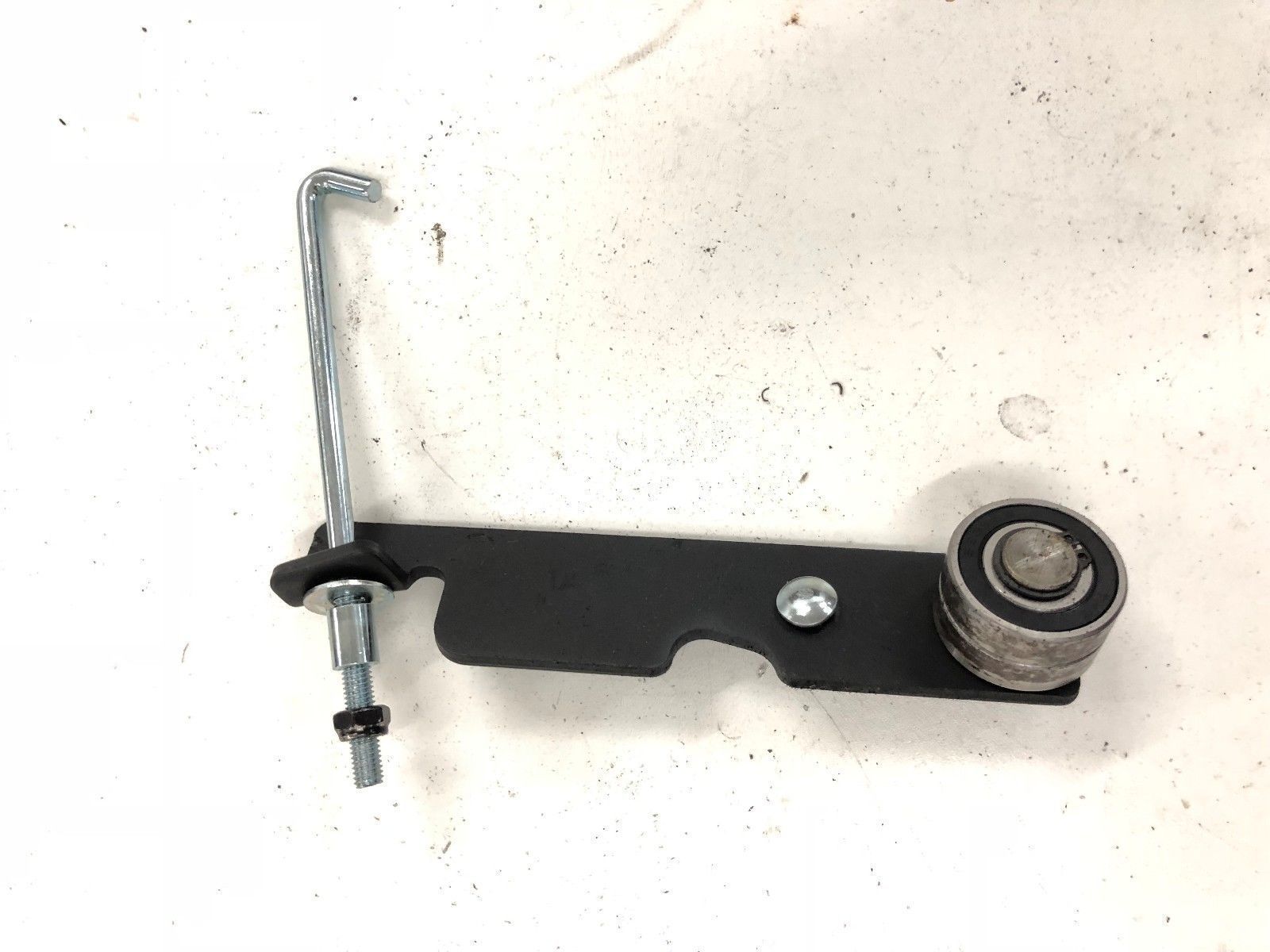 Belt Tension Assembly Idler Wheel Arm (Used)